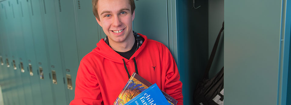 Student in red sweatshirt