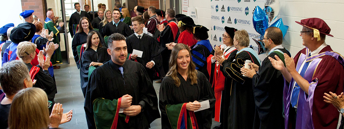 Graduates walking in line
