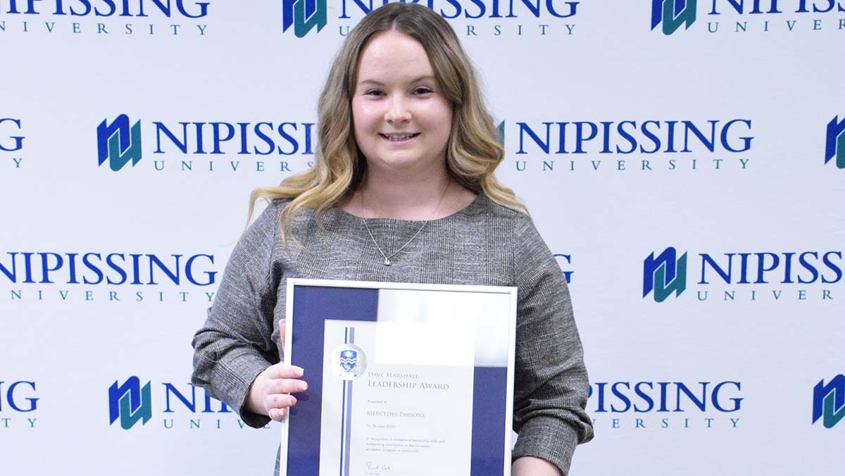 Mercedes Parsons with award