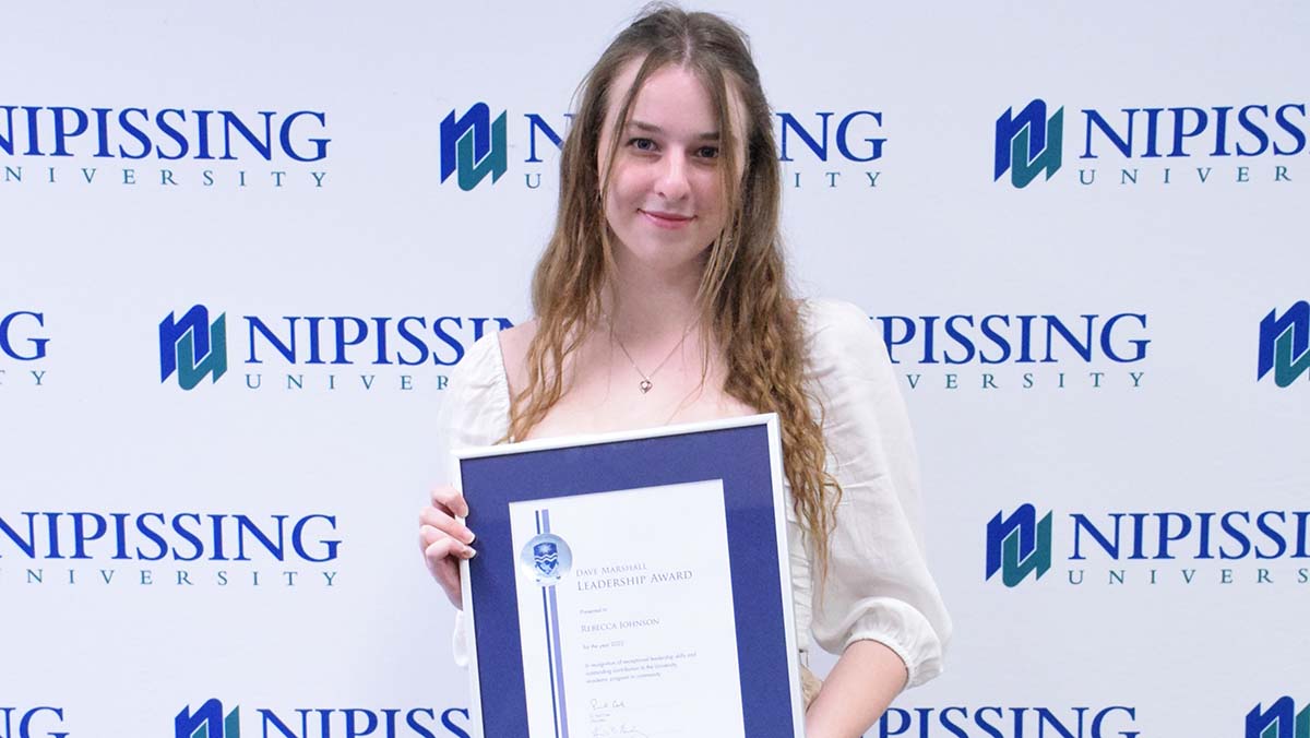 Rebecca Johnson with award