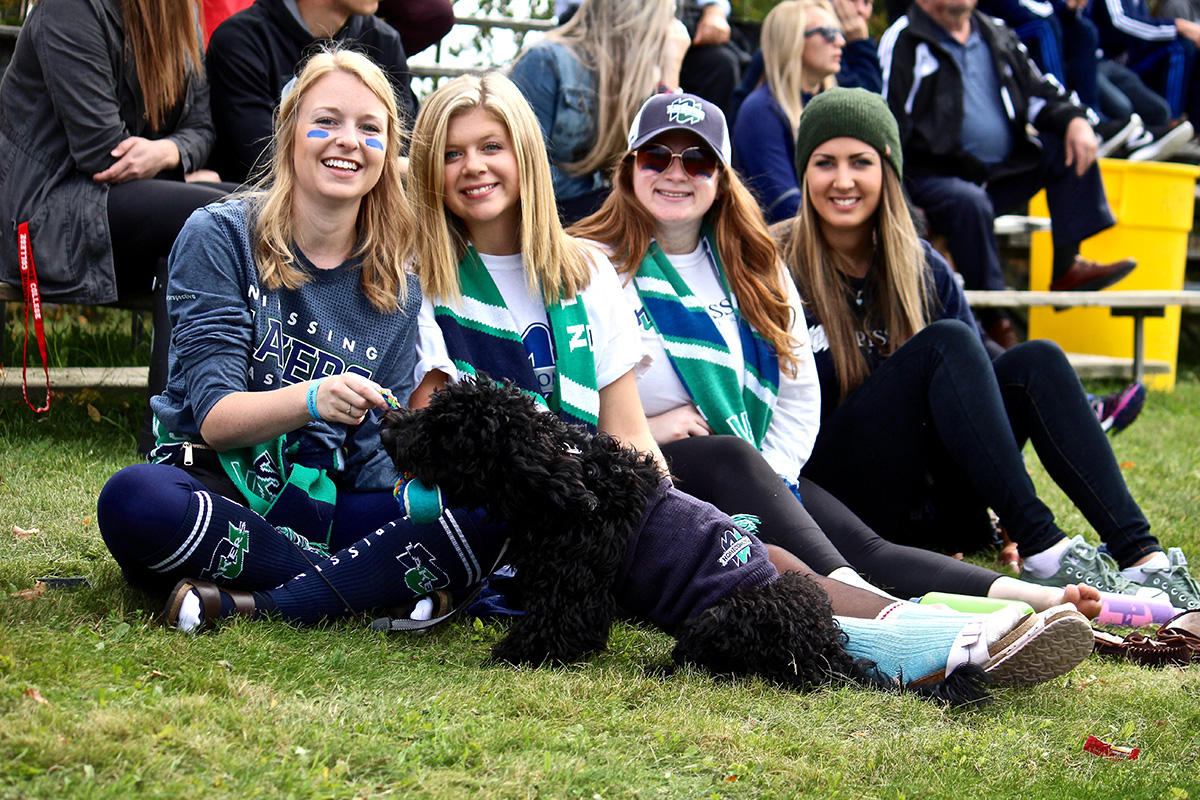 Group sitting on grass