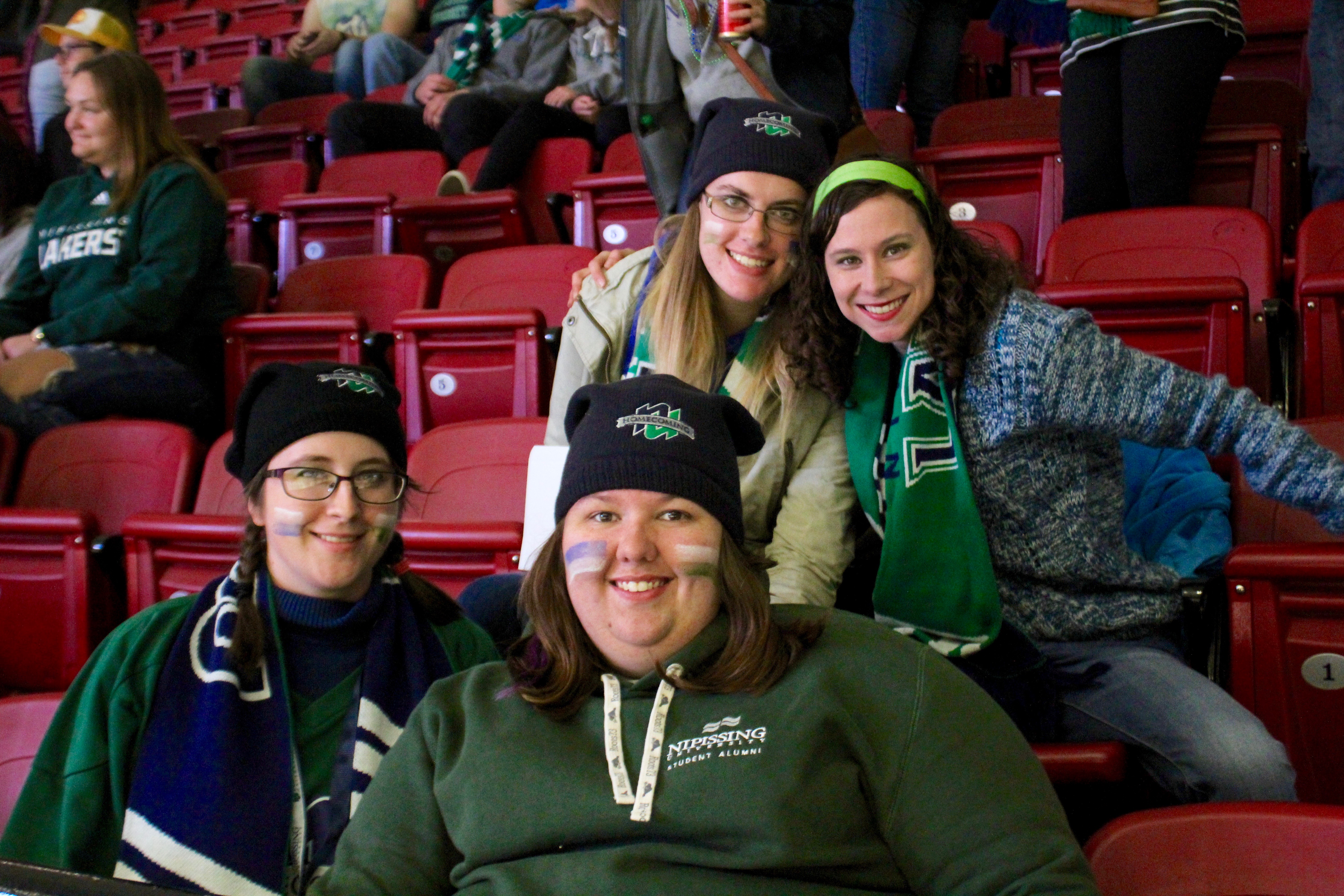 Students watching Lakers hockey in Memorial Gardens at Homecoming