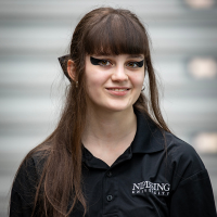 Image of Student Orientation Assistant in black Nipissing University polo shirt