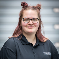 Image of Student Orientation Assistant in black Nipissing University polo shirt