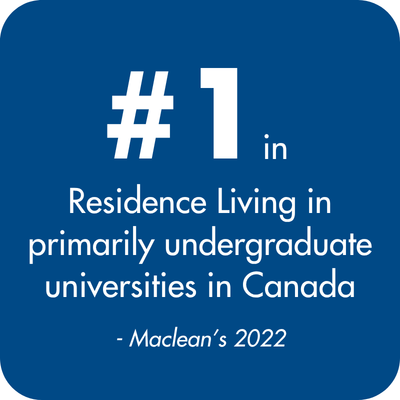 A blue bubble that reads "# 1 in Residence Living in primarily undergraduate universities in Canada - Maclean’s 2022"
