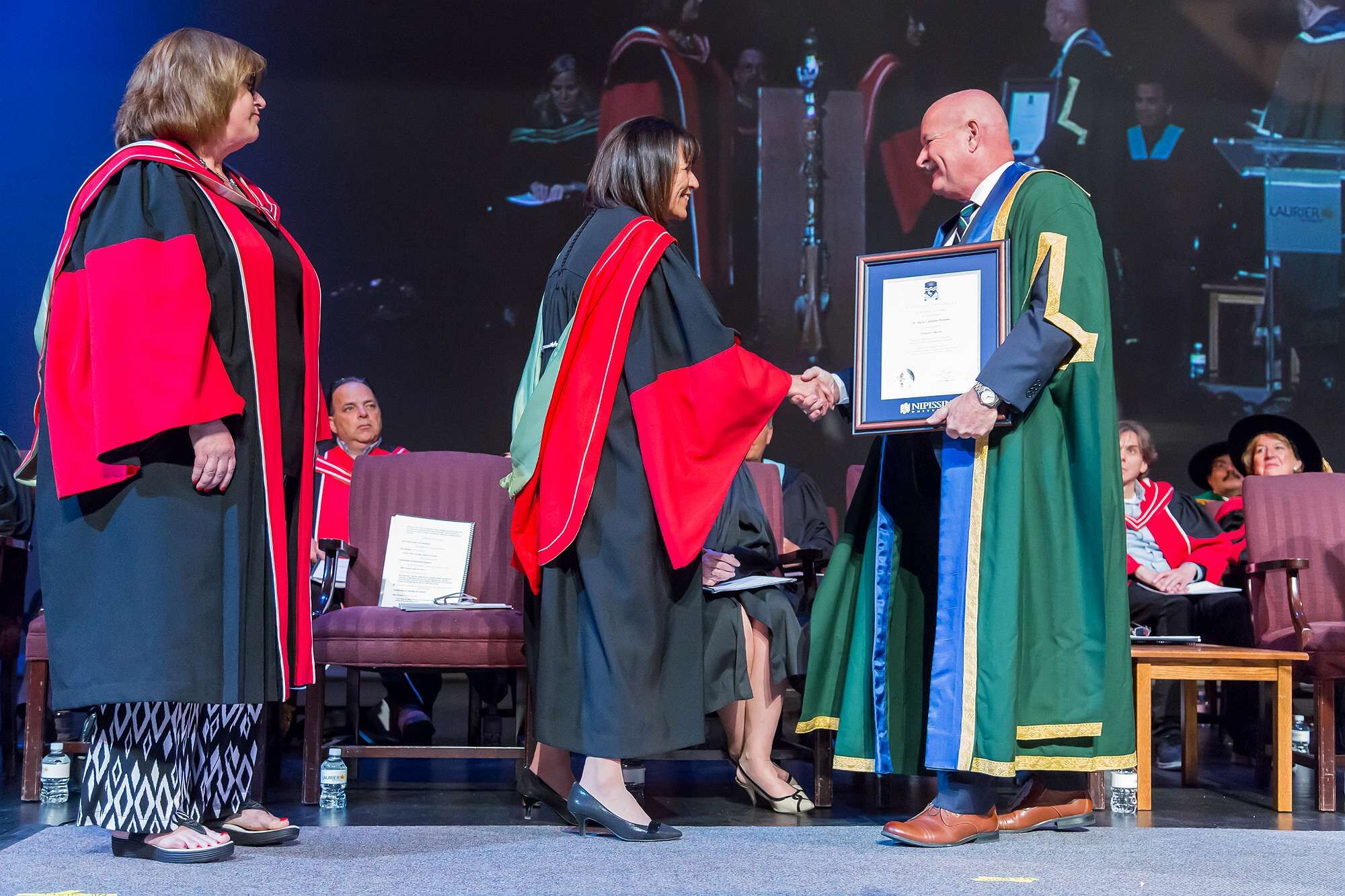 Dr. Maria Cantalini-Williams receiving award from Chancellor