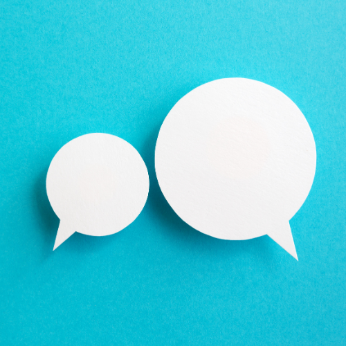 Blue background with two white cardstock speech bubbles on top.