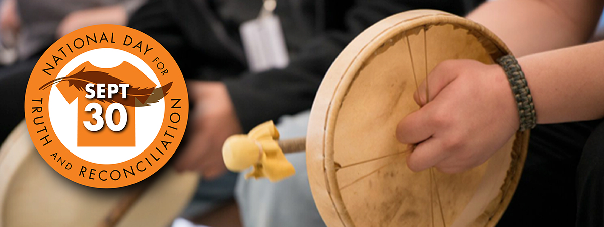 orange shirt logo and drum