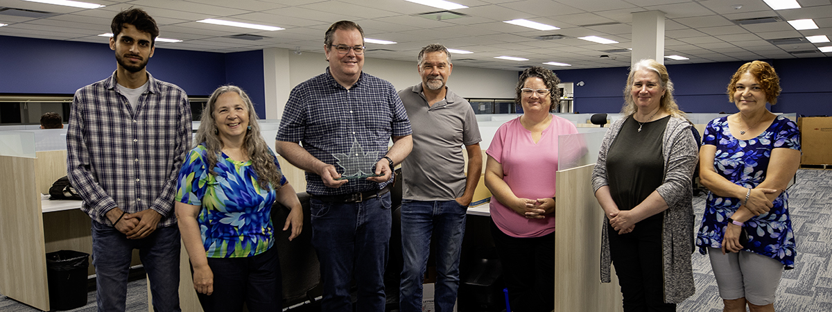 UTS Staff hold their CUCCIO award 