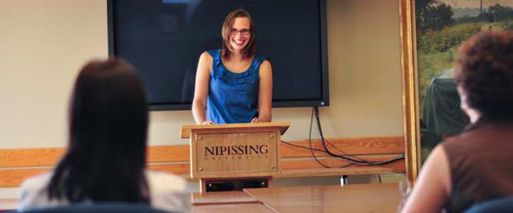 Lecturer at podium