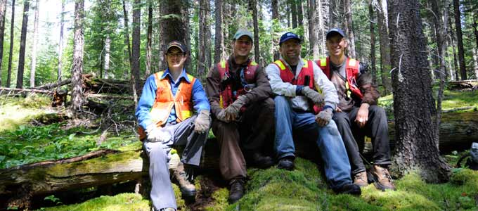 forest resource lab members taking a break from field work