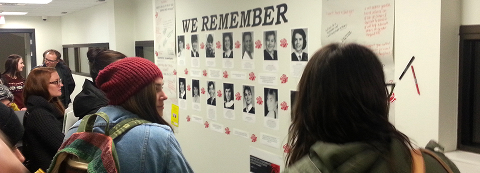 students looking at a memorial