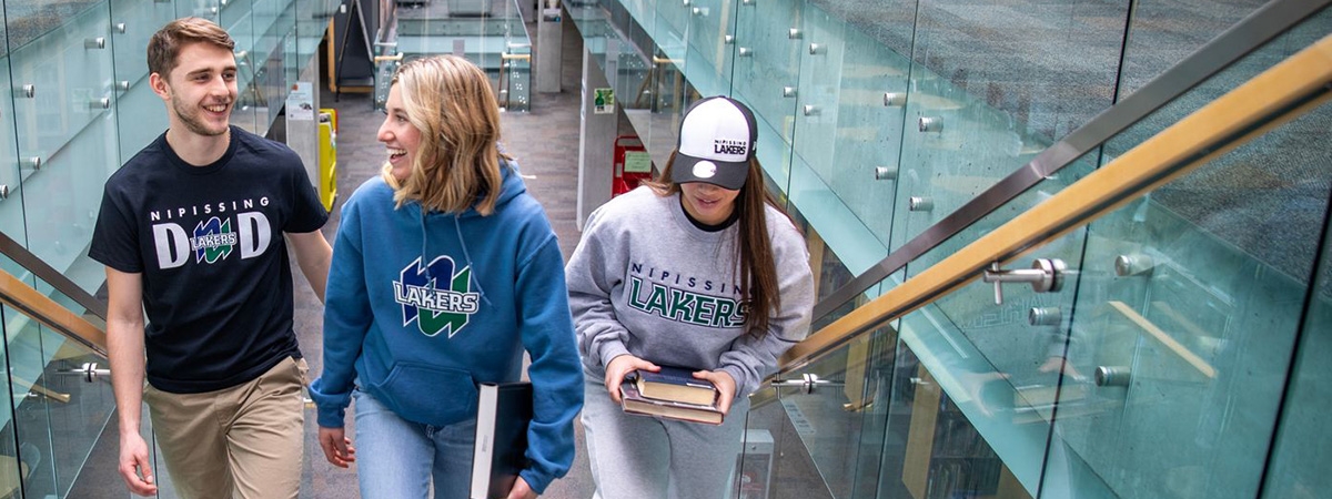 students with lakers branded clothing