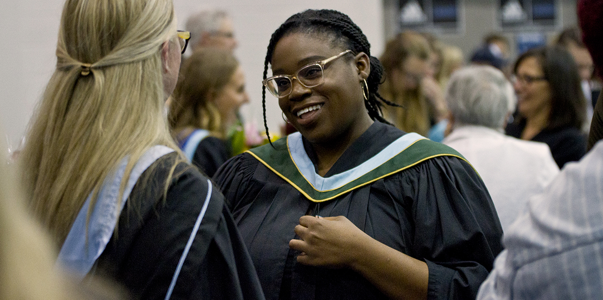 new grad is congratulated