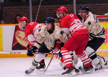Men's Hockey battles RMC