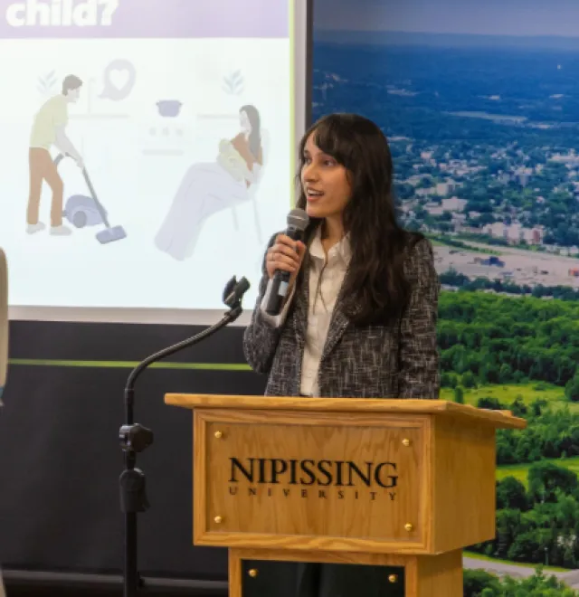 Ananya Singh presenting at 3MT