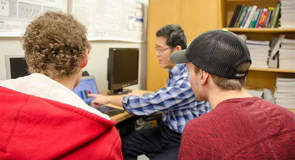 Collaborative Systems Laboratory students with professor