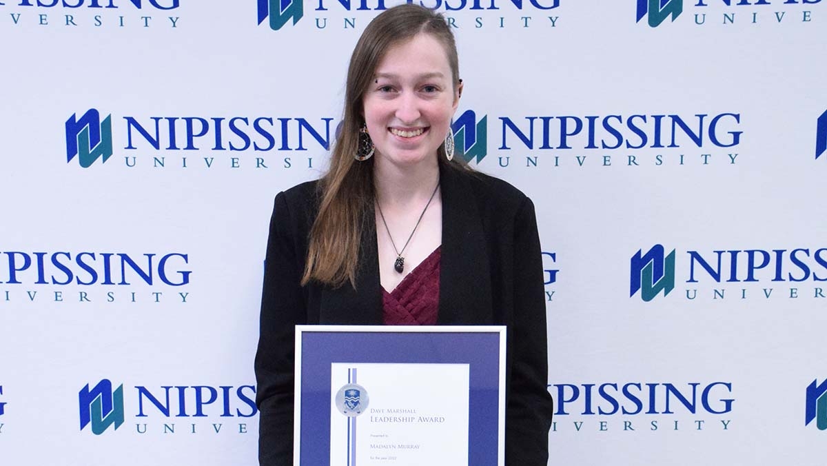 Madalyn Murray with award