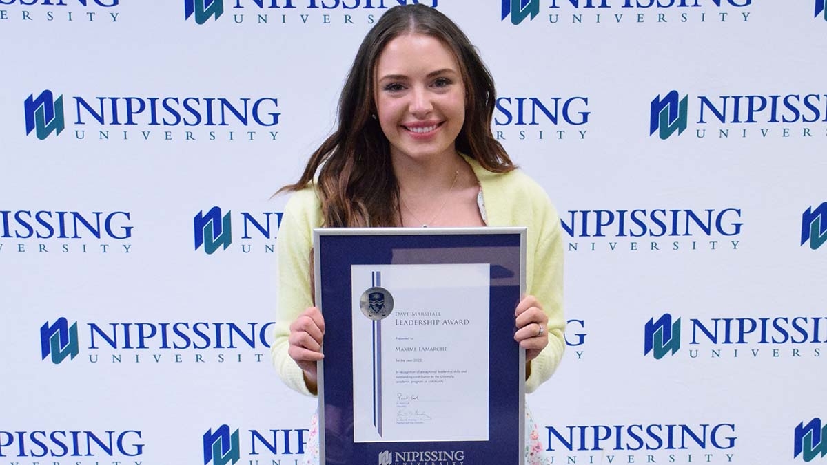 Maxime Lamarche with award