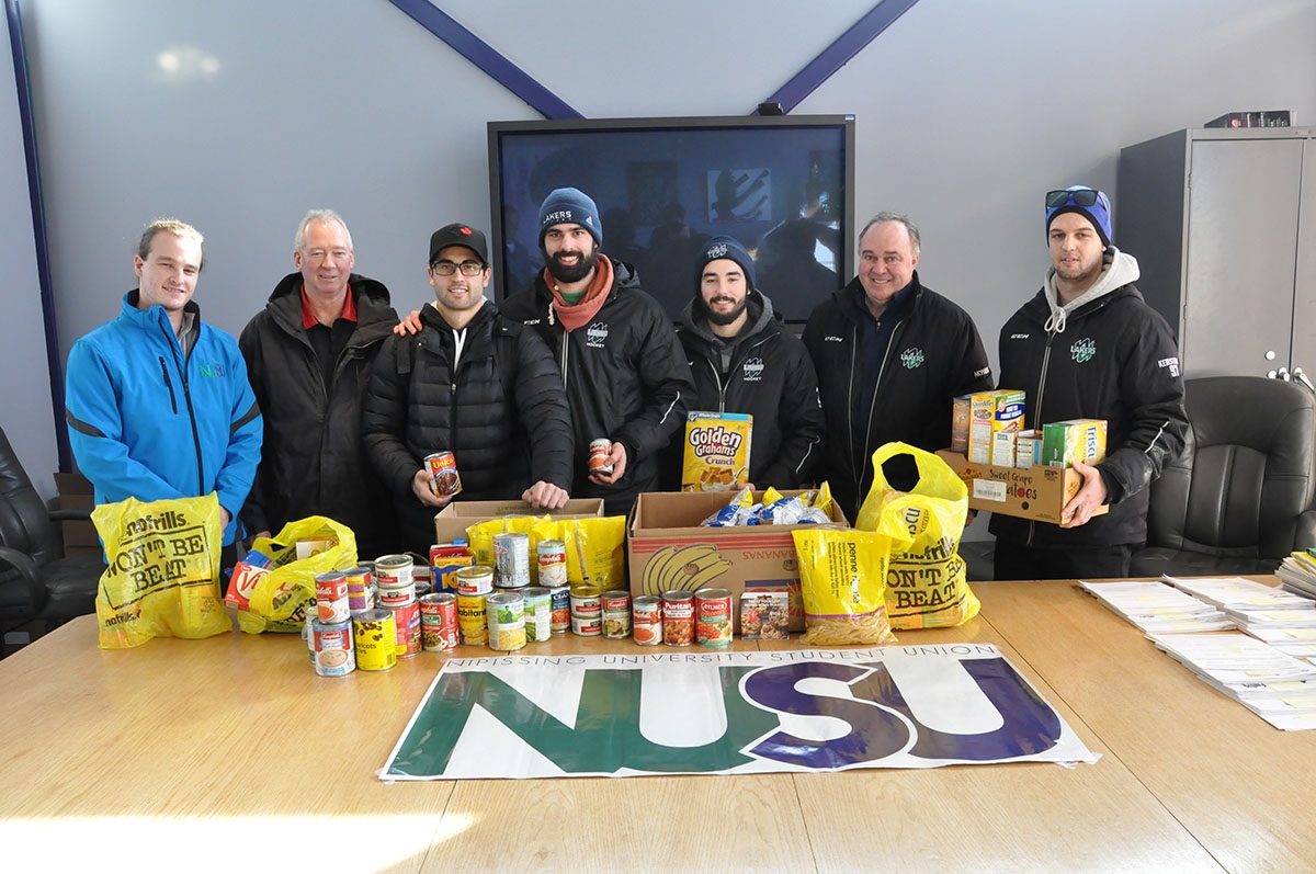 Food bank donation from hockey team