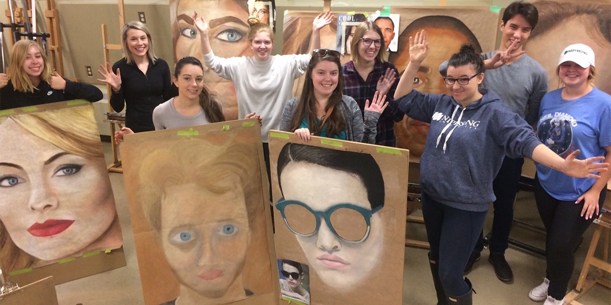 students with portraits