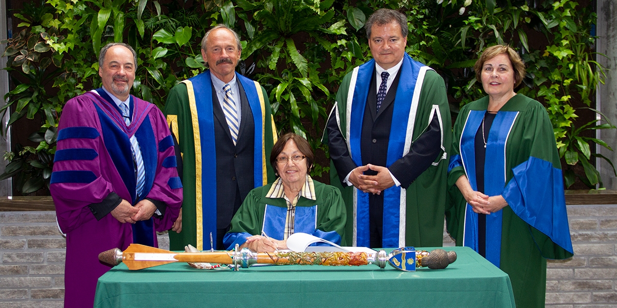 Muriel Sawyer receives honorary degree with dignitaries