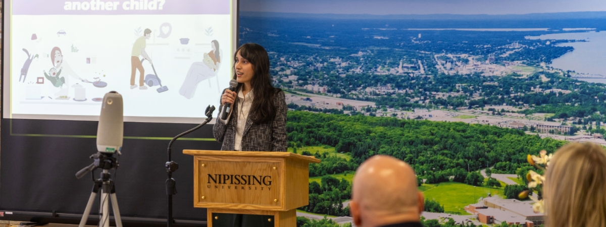 Ananya Singh presenting at Nipissing Univeristy's Three Minute Thesis Competition