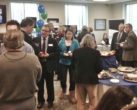 Photo of people mingling at a social event