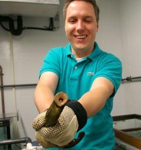Warren Green holding lamprey