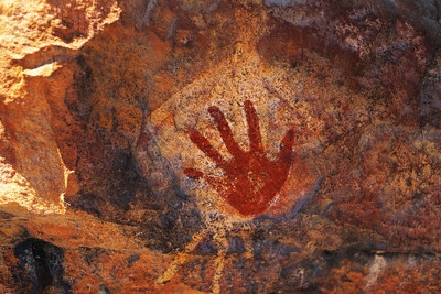 Image of a handprint on a rock face