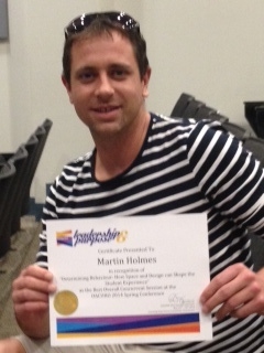 Martin Holmes with award