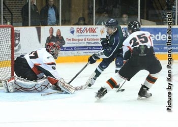 Men's Hockey Pat on goal