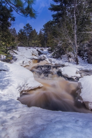 Photo of waterfall in the snow