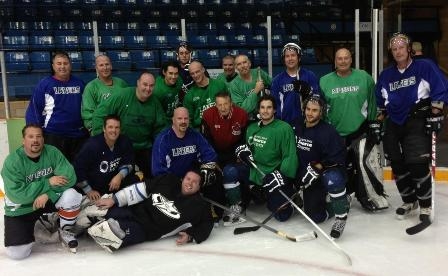 Photo of Alumni and Friends hockey game participants