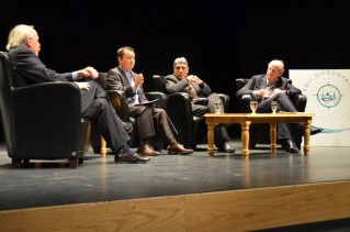 Photo of panel discussion participants on stage