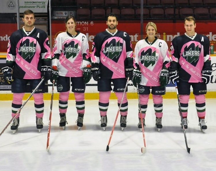 Hockey players is pink jerseys