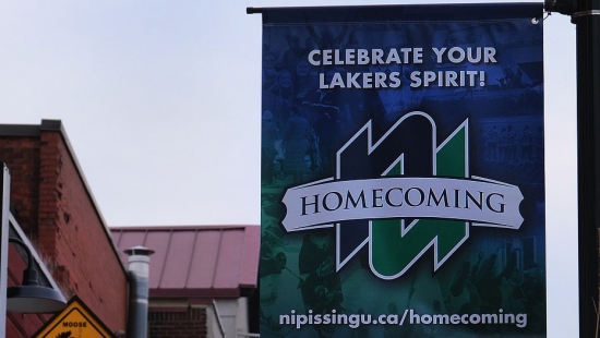 Nipissing Homecoming banners in downtown North Bay