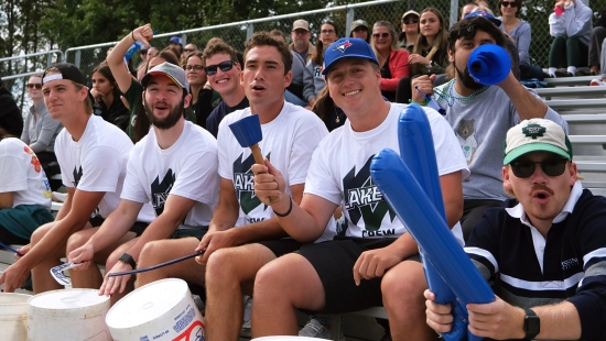 Student and alumni fans cheering on the Lakers during Homecoming weekend