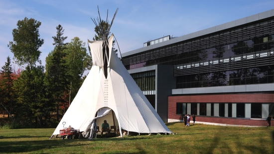 Kicking off Homecoming weekend with a bonfire in the Library Teepee