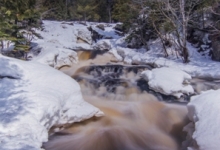 Photo of waterfall in the snow