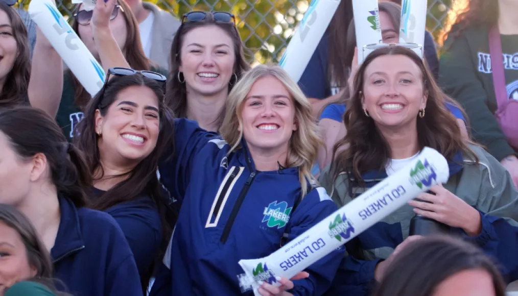 Fans cheering on the Nipissing Lakers at Homecoming 2025