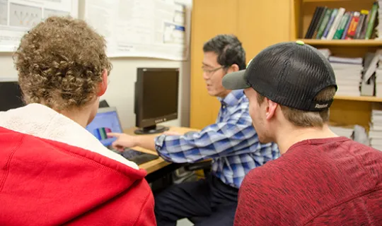 Collaborative Systems Laboratory students with professor