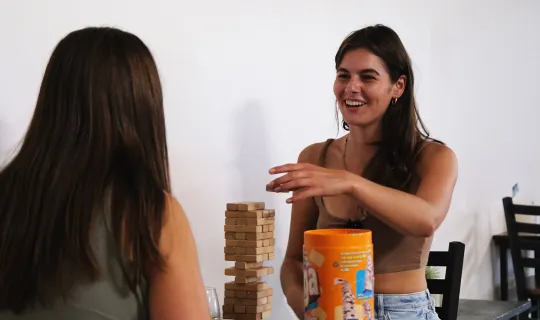 Lakers students and alumni playing board games