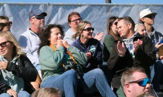 Crowd cheering during NU Homecoming 2025 games