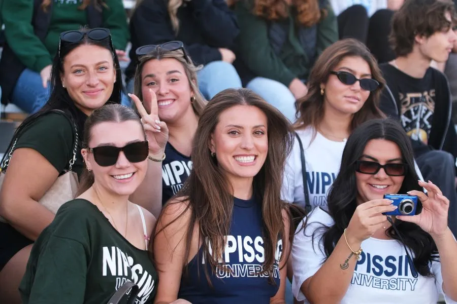 Lakers posing for a photo during NU Homecoming 2025 