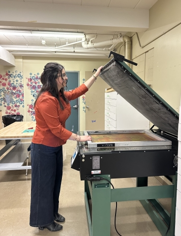 Student using the UV exposure unit