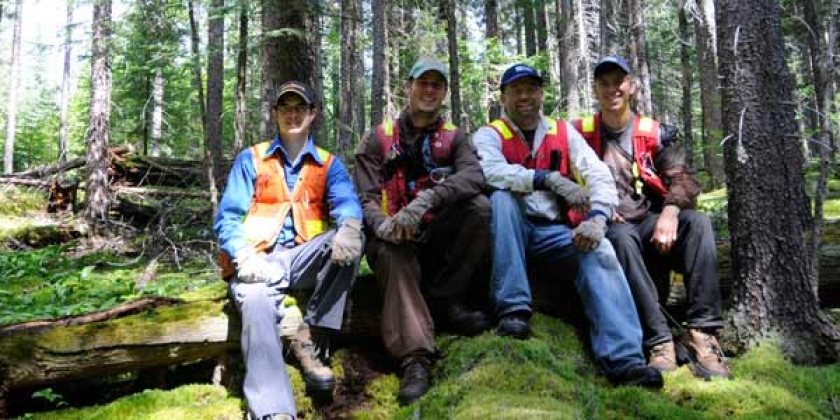 forest resource lab members taking a break from field work